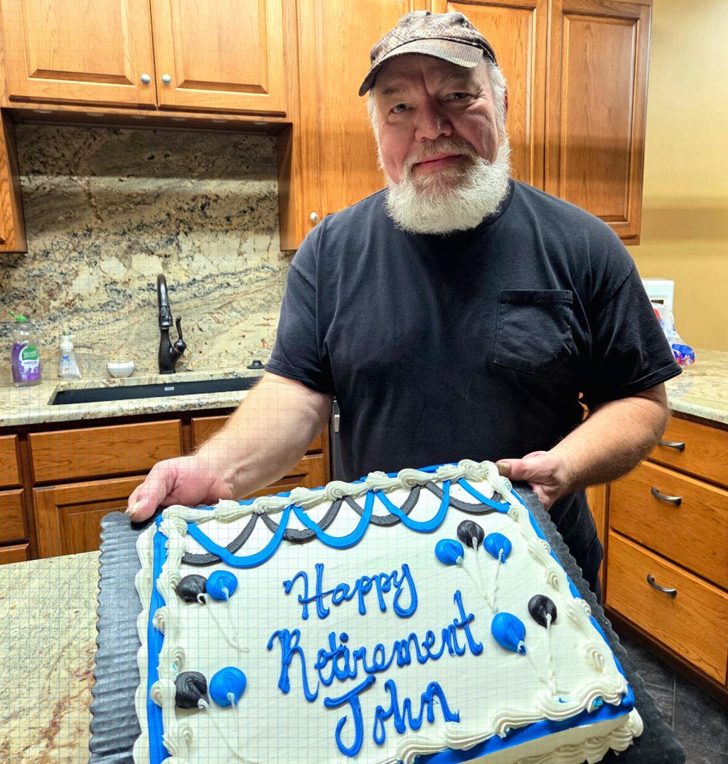 Man holding a cake